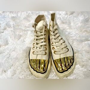 Schiaparelli sneakers size 38. NWOB sample sale purchase. Shoes run large.